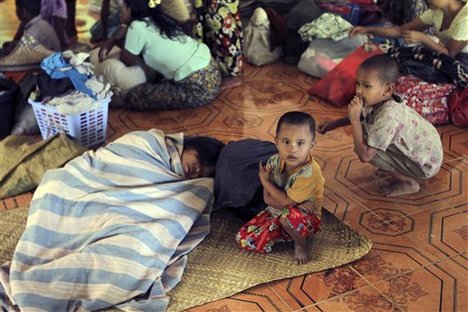 Ethnic Rakhine people take refugee at a relief camp, in Mrauk U, in Rakhine state, western Myanmar, Thursday, Nov. 8, 2012.