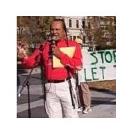 Russell Means speaks against the War on Terror at a DC Anti-War Network's anti-war protest on November 11, 2001.