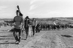 On March 10, 1973, more than one week after seizing Wounded Knee, S.D., and starting a standoff with federal authorities, members of the Oglala Sioux tribe march to the cemetery where their ancestors were buried following the 1890 massacre at the site.