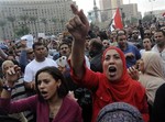 Egyptian protesters opposed to president Mohammed Morsi chant slogans in Tahrir Square in Cairo, Egypt, Friday, Nov. 23, 2012.