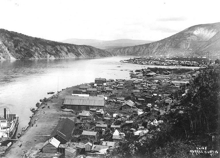 View of Klondike City and Dawson City, 1899. Yukon River left and Klondike River at upper right