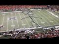 University of Hawaii Marching Band forms giant stick football player; kicker