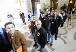 About a dozen couples line up at San Francisco’s City Hall to apply for marriage licenses as part of a Valentine’s Day ritual demonstrating for same-sex marriage on Thursday, Feb. 14, 2008.