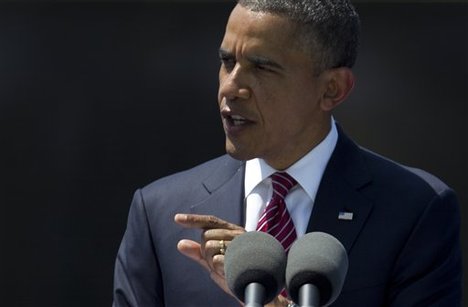 President Barack Obama speaks during a Memorial Day ceremony at the Vietnam Veterans Memorial Wall to commemorate the 50th anniversary of the Vietnam War, Monday, May 28, 2012, in Washington.