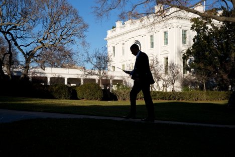 File - President Barack Obama returns to the White House following the Tribal Nations Conference at the Department of the Interior in Washington, D.C., Dec. 5, 2012.