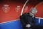 Real Madrid's coach Jose Mourinho from Portugal, sits in the dugout ahead of their Spanish La Liga soccer match, against Osasuna, at Reyno de Navarra stadium in Pamplona, northern Spain, Saturday March 31, 2012. real Madrid won 5-1.