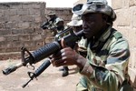 File - Senegalese and Malian soldiers train with U.S. special forces in Mali during a military training engagement, May 11, 2010 in Bamako, Mali as part of Exercise Flintlock 10.