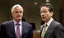 European Commissioner for Internal Market Michel Barnier, left, speaks with Dutch Finance Minister and newly appointed chief of the eurogroup Jeroen Dijsselbloem during a meeting of EU finance ministers at the EU Council building in Brussels on Tuesday, Jan. 22, 2013. Eleven eurozone countries seeking to unilaterally implement a financial transaction tax are expected Tuesday to receive the blessing of other European Union countries, bringing the once-controversial project one step closer to reality. At center is Thomas Weber, and member of the EU delegation.