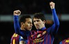 FC Barcelona's Lionel Messi, from Argentina, reacts after scoring against Granada during a Spanish La Liga soccer match at the Camp Nou stadium in Barcelona, Spain, Tuesday, March 20, 2012.