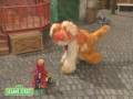 Sesame Street: Elmo Riding A Tricycle