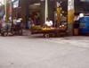 Philippines basic life - Philippines economic society - Philippines sidewalk vendor - small business for living - small push cart loaded with fruits and vegetables for sell