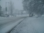 Route 27 in Highland Park during the February 9–10, 2010 North American blizzard. Upon entering Highland Park, Route 27 becomes two-lane Raritan Avenue, intersecting County Route 622 (River Road) and continuing through the downtown area of Highland Park.