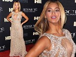 She's got some front! Beyonce displays plenty of cleavage in a daring sheer floorlength gown at the premiere of her documentary Life Is But A Dream 