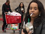 Missing Whitney: Downcast Bobbi Kristina puffs on cigarette as she stocks up at discount store on anniversary of mother's death