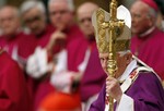 Pope Benedict XVI arrives for a memorial Mass at St. Peter's Basilica, at the Vatican, to mark the fifth anniversary of the death of Pope John Paul II, Monday, March 29, 2010