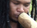 DIDGERIDOO, ABORIGINAL BAMBOO INSTRUMENT, AUSTRALIA.