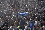 Kashmiri villagers carry the coffin of Student Mudasir Ahmed Malla during a funreal procession at Parigam village of Pulwama district 40 kms From Srinagar, India, on Monday 04, March 2013. who allegdly committed suicide in his hostel at Hyderabad in Andrapradesh. Locals here claimed that the student was tortured to death.