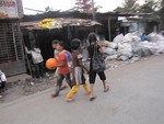 File - Street children in a slum area in India.