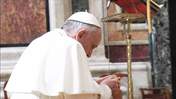 Pope Francis prays in Santa Maria Maggiore in Rome.