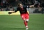 Jerome Rothen of Paris Saint-Germain (PSG), reacts after teammate Pedro Pauleta, unseen, scored the opening goal against Lens during their French league One soccer match at the Parc des Princes stadium in Paris, Sunday, Jan. 13, 2008.