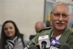 David Ranta, right, smiles while speaking to reporters at Brooklyn Supreme court in New York Thursday, March 21, 2013.