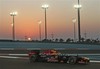 Red Bull driver Sebastian Vettel of Germany steers his car during the second free practice session at the Yas Marina racetrack in Abu Dhabi, United Arab Emirates, Friday, Nov. 2, 2012.