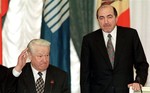 In this April 29, 1998 file photo, President Boris Yeltsin presents Boris Berezovsky, one of Russia's most prominent tycoons, as new executive secretary of the Commonwealth of Independent States at the alliance's summit in Moscow.