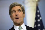 Secretary of State John Kerry speaks during a brief news conference with European Union foreign policy chief Catherine Ashton, before their meeting