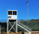 File - The guard tower at a recreation yard under construction in Camp 6 at Joint Task Force Guantanamo in Guantanamo Bay, Cuba, Feb. 17, 2012.