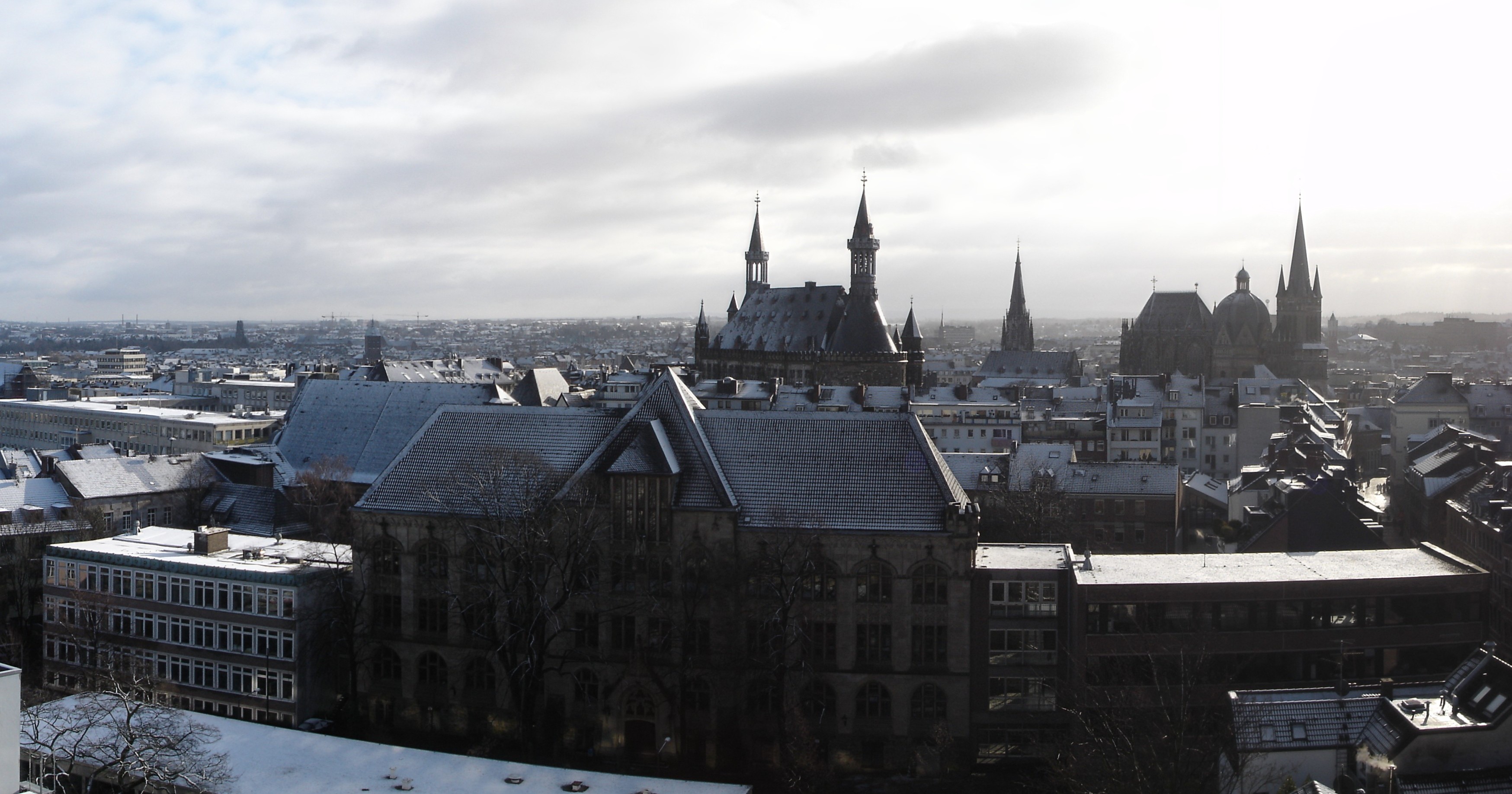 Panoramic view of Aachen, including Kaiser Karls Gymnasium (foreground), townhall (back center) and cathedral (back right)