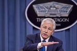 Defense Secretary Chuck Hagel and Army Gen. Martin E. Dempsey, chairman of the Joint Chiefs of Staff (not pictured), brief the press at the Pentagon, April 10, 2013.