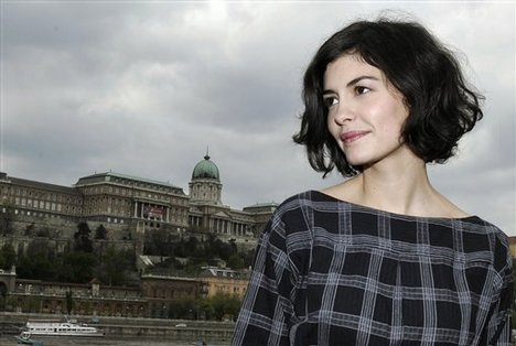 France's film diva Audrey Tautou poses in front of Buda Castle and the River Danube in downtown Budapest, Hungary, Friday, April 18, 2008