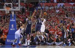 Los Angeles Clippers guard Chris Paul, second from right, scores the game winning basket over Memphis Grizzlies' Darrell Arthur and Tony Allen as Mike Conley, right, and Blake Griffin look on during the second half of Game 2 of a first-round NBA basketball playoff series, Monday, April 22, 2013, in Los Angeles. The Clippers won 93-91. (AP Photo/Mark J. Terrill)