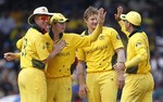 Australia's Steve Smith, second from left, celebrates with captain Ricky Ponting, right, Brett Lee, left, and Shane Watson after his return run out Sri Lanka's batsman Mahela Jayawardene during their ICC Cricket World Cup match in Colombo, Sri Lanka, Saturday March 5, 2011.