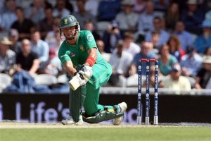 South Africa's Herschelle Gibbs scores runs to reach his 50 from West Indies' Kieron Pollard during their Twenty20 World Cup cricket match at the Oval cricket ground, London, Saturday June 13, 2009.