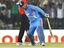 India's captain Virender Sehwag celebrates scoring double century and his world record one-day score during their fourth one day international cricket match against West Indies in Indore, India, Thursday, Dec. 8, 2011. Sehwag smashed compatriot Sachin Tendulkar's world record one-day score.