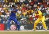 Sri Lanka captain Kumar Sangakkara plays a shot as Australian wicket keeper Brad Haddin looks on during the ICC Cricket World Cup match between Australia and Sri Lanka in Colombo, Sri Lanka, Saturday, March 5, 2011.