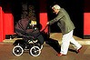 sad010831.001.001.jpg; Photograph Sean Davey; Generic photograph; an elderly man pushes a pram up King St Newtown; childcare; pension; strolla; baby;  copyright Sean Davey; for use in all fairfax publications; NO SALES;