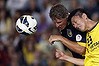 Australia's Central Coast Mariners player Patrick Zwaanswijk (L) competes for the ball with Hirofumi Watanabe from Japan's Kashiwa Reysol during their AFC Champions League match at the Central Coast Stadium in Gosford April 30, 2013.    REUTERS/David Gray     (AUSTRALIA - Tags: SPORT SOCCER)