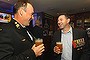 Afghanistan veteran Chief Petty Officer Chris Wright (left) and Gulf War and Iraq War veteran Gavin Stevens (right) catch up before marching in the 98th ANZAC Day Parade in Sydney.