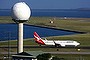 A Qantas Airways plane passes a radar tower after landing at Sydney Airport April 29, 2013. An annual report on Australia's five major airports in Sydney, Adelaide, Brisbane, Melbourne, and Perth by the Australian Competition and Consumer Commission (ACCC), found that overall quality of service levels dropped in 2011-12 local media reported. The report added that Sydney Airport is potentially the biggest concern 