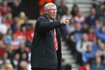 Manchester United's manager Alex Ferguson reacts as he watches his team play against Southampton during their English Premier League soccer match at St Mary's stadium, Southampton, England, Sunday, Sept. 2, 2012. Alex Ferguson marks his 1000th match in charge of Manchester United.