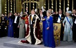 Dutch King Willem-Alexander is given three cheers by guests and his wife Queen Maxima inside the Nieuwe Kerk or New Church in Amsterdam, The Netherlands, during his inauguration Tuesday April 30, 2013.