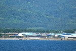 NOVEMBER 8 , 2008 , MINDANAO SEA , PHILIPPINES - OVERLOOKING SMALL HOUSES IN ZAMBOANGA ISLAND FROM  MINDANAO SEA