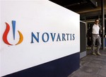  The headquarters of Swiss pharmaceutical company Novartis in Basel, Switzerland, are seen in this file picture taken Aug. 12, 2006. Novartis AG said Thursday Oct. 18, 2007 that its third-quarter earnings more than tripled due to large divestments, but th