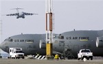 US military planes , are seen at Manas US military base in Bishkek airport Kyrgyzstan on Thursday, Feb. 12, 2009. Kyrgyz President Kurmanbek Bakiyev last week announced the closure of the base, which is a crucial staging post for coalition operations in Afghanistan. The U.S. began using the Manas base in December 200