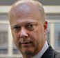 Justice Secretary Chris Grayling, pictured earlier this year on a visit to Pentonville Prison, wants ex-inmates to mentor other criminals