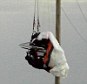 Dramatic moment a paraglider miraculously survives after crashing into electric cables and feels the charge through his body