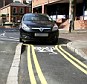 You definitely can't park here! Council paint double yellow lines down a cycle path which is too narrow for a car to get down