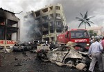 The site of one of the explosions after several explosions killed at least 40 people and injured dozens in Reyhanli, near Turkey's border with Syria, Saturday, May 11, 2013, Turkish Interior Minister Muammer Guler said.